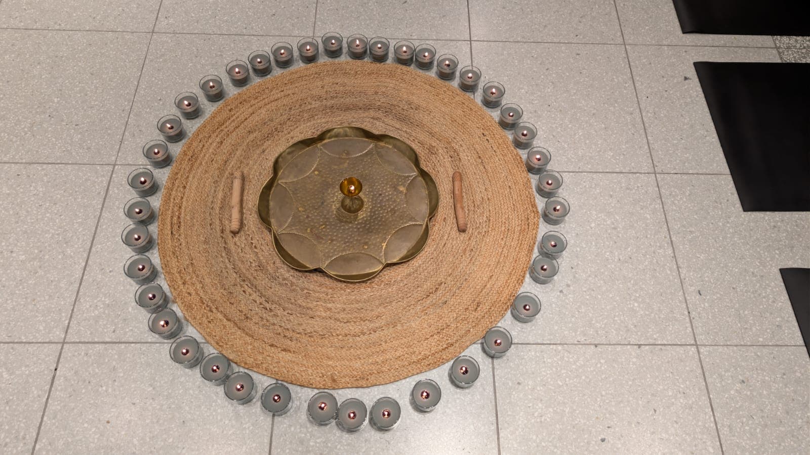 A moment of stillness within a ceremony circle on Country